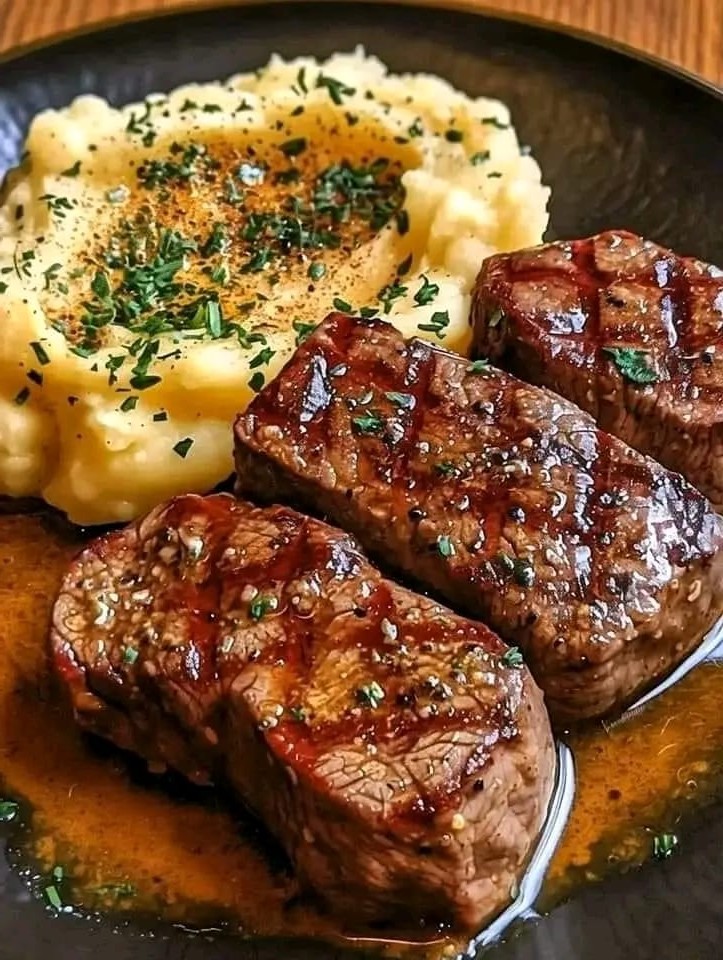 Grilled Steak with Garlic Mashed Potatoes and Herb Butter Sauce - CYSSERO